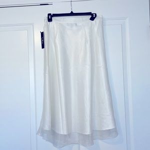 Brand new with tags midi white skirt! Size medium.